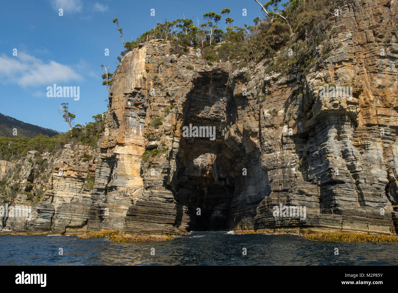 Patersons Arch in Waterfall Bay, Tasman NP, Tasmania, Australia Stock ...