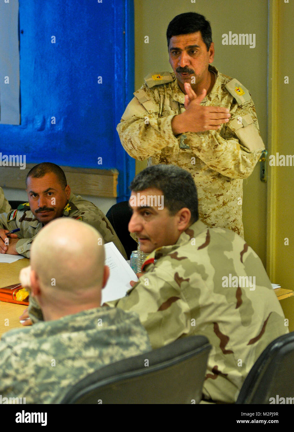 Maj Rashed Maj. Hatam instructs officers. KIRKUSH MILITARY TRAINING BASE, Iraq ...