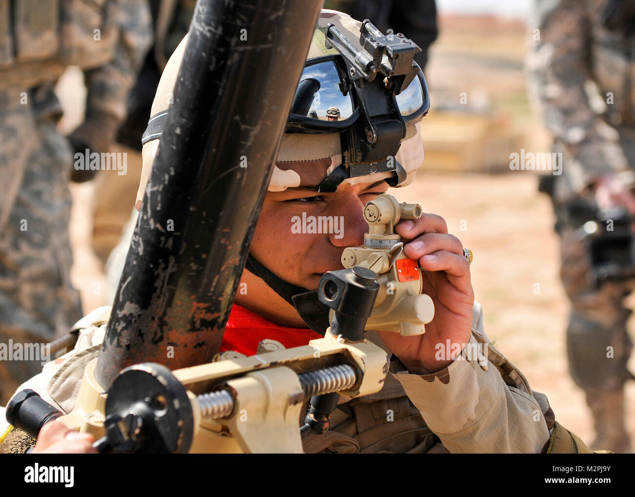 Pvt. Dhiya aligns mortar sight. KIRKUSH MILITARY TRAINING BASE, Iraq Iraqi Army Pvt. Dhiya