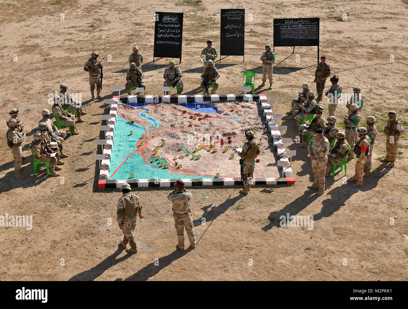 Iraqi leaders plan assault. FORWARD OPERATING BASE NORMANDY, Iraq