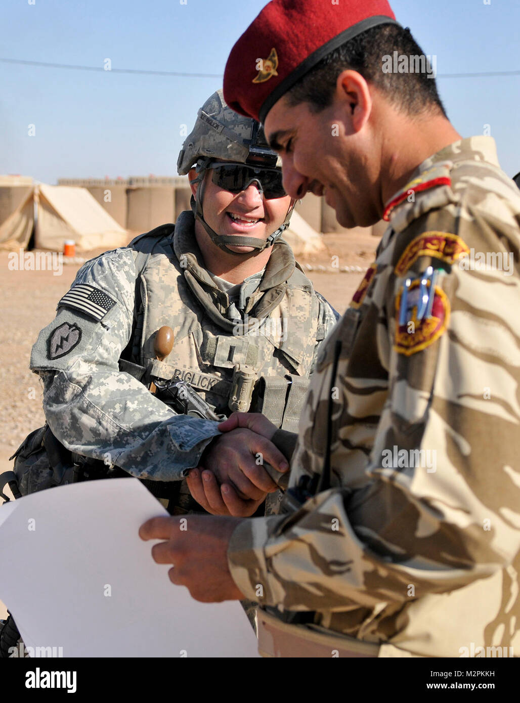Riglick thanks Col. Anwar. KIRKUSH MILITARY TRAINING BASE, Iraq – U.S ...