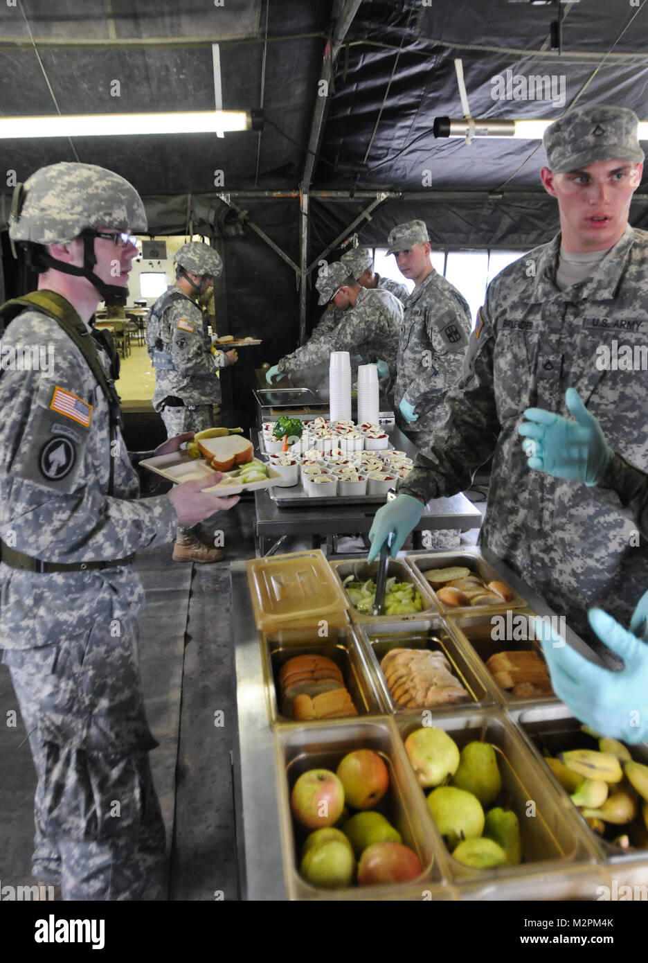 The nutriional specialists of the 452nd Combat Support Hospital serve members of their battalion lunch during the U.S. Army Reserve's Connelly Competition at Fort McCoy, Wis., on April 9.  (Photo by Maj. Matt Lawrence, 807th MDSC Public Affairs) 20110409-DSC 2987 by 807MCDS Stock Photo