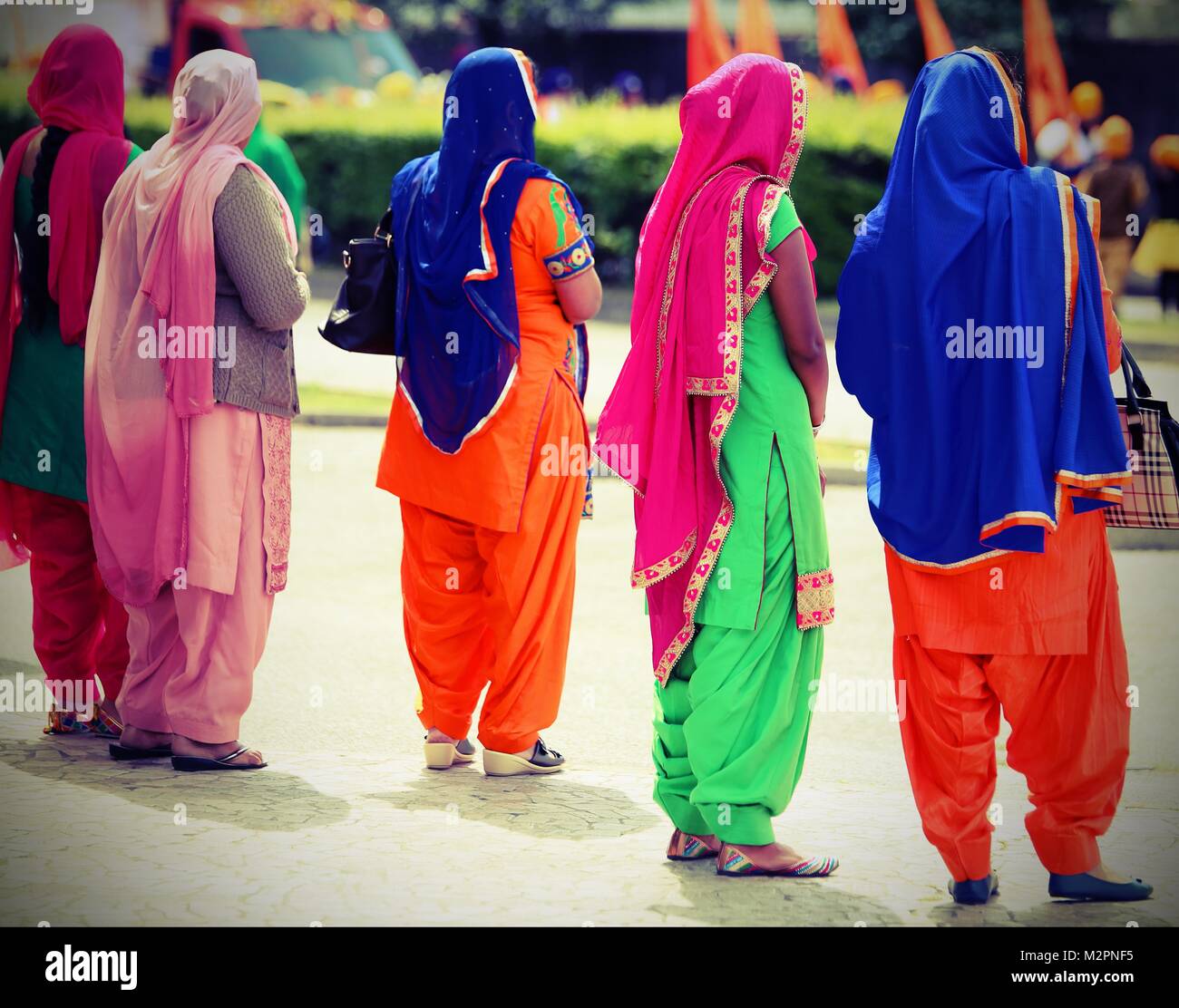 Five women on the street hi-res stock photography and images - Alamy
