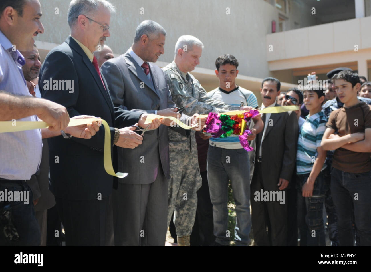 Cutting a ceremonial ribbon by United States Forces - Iraq (Inactive ...