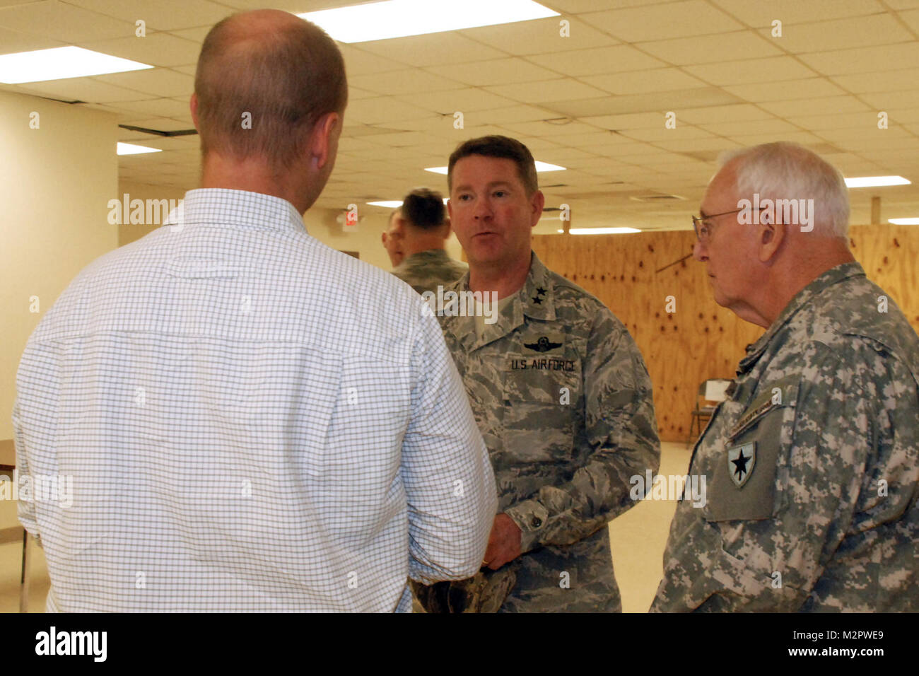 Major General John F. Nichols, Texas Adjutant General, meets with Brownwood Mayor Stephen Haynes and Texas State Guard Commanding General, Major General Raymond Peters  during this year's annual training at Camp Bowie in Brownwood. During the visit, Nichols was briefed on various subjects, met with Soldiers, and thanked Brownwood for its hospitality over the years. (U.S. Army Photo/ Laura Lopez) 110611-A-ZB630-055.JPG by Texas Military Department Stock Photo