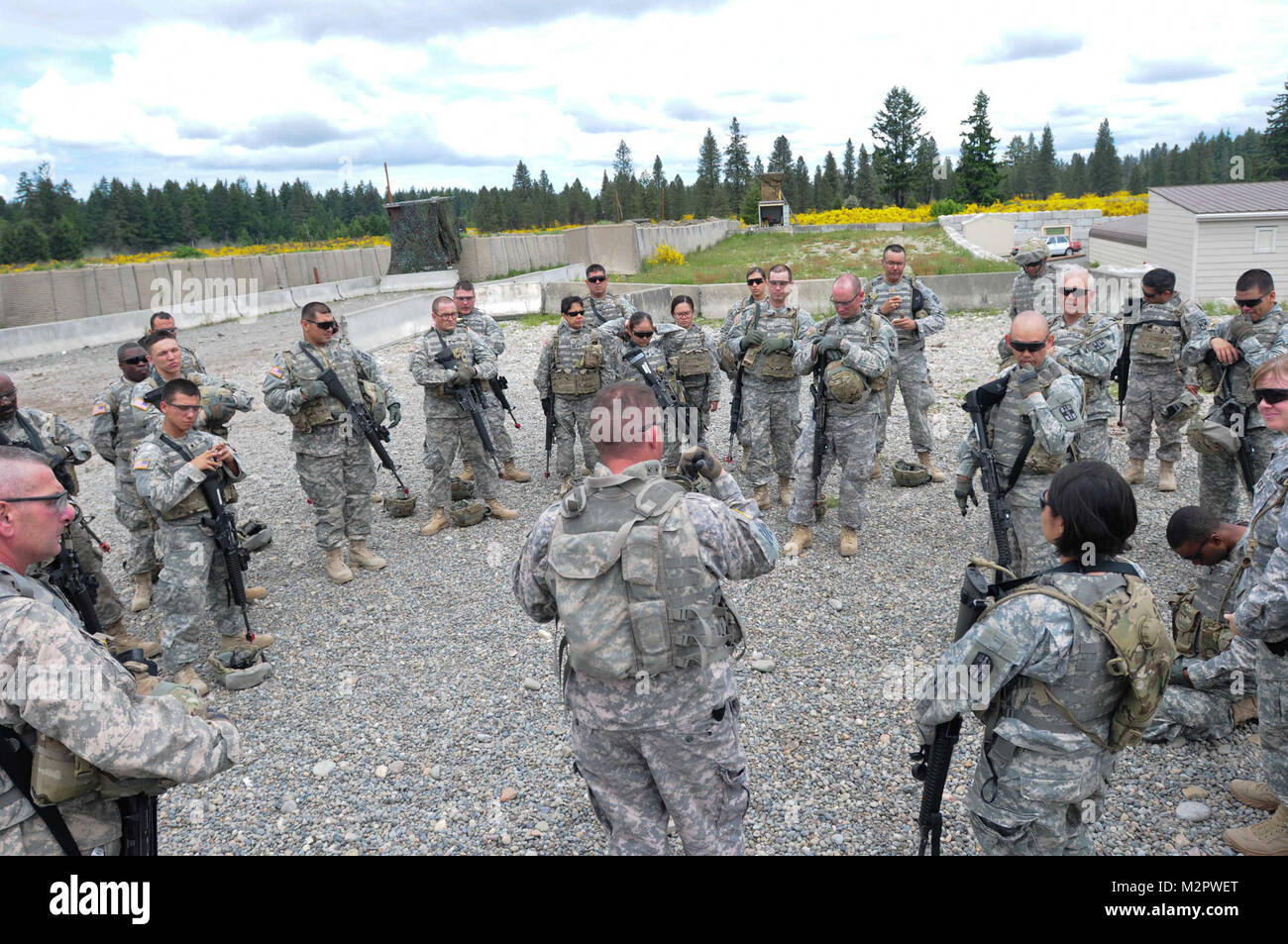 Soldiers of the 113th Combat Stress Control Detachment conduct an after action review on entry control point training at Joint Base Lewis McChord, Wash.  The 113th is preparing for deployment to Afghanistan.  (photo by Maj. Matt Lawrence, 807th MDSC Public Affairs) 20110611-DSC 6131-122 by 807MCDS Stock Photo