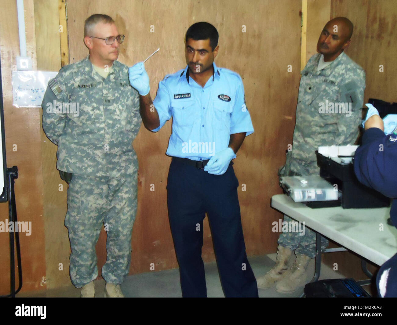 BAGHDAD—Bob Wirkner, left, a law enforcement professional attached to Company D, 1st Battalion