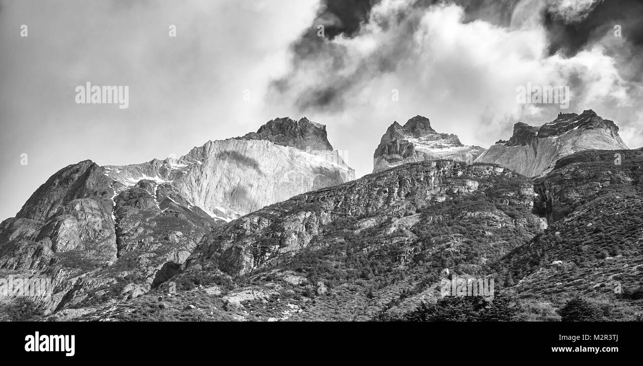 Black and white panoramic picture of the Cuernos del Paine rock formations in the Torres del Paine National Park, Chile. Stock Photo