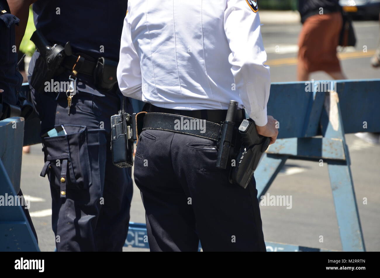 Nypd cops guns belts hi res stock photography and images Alamy