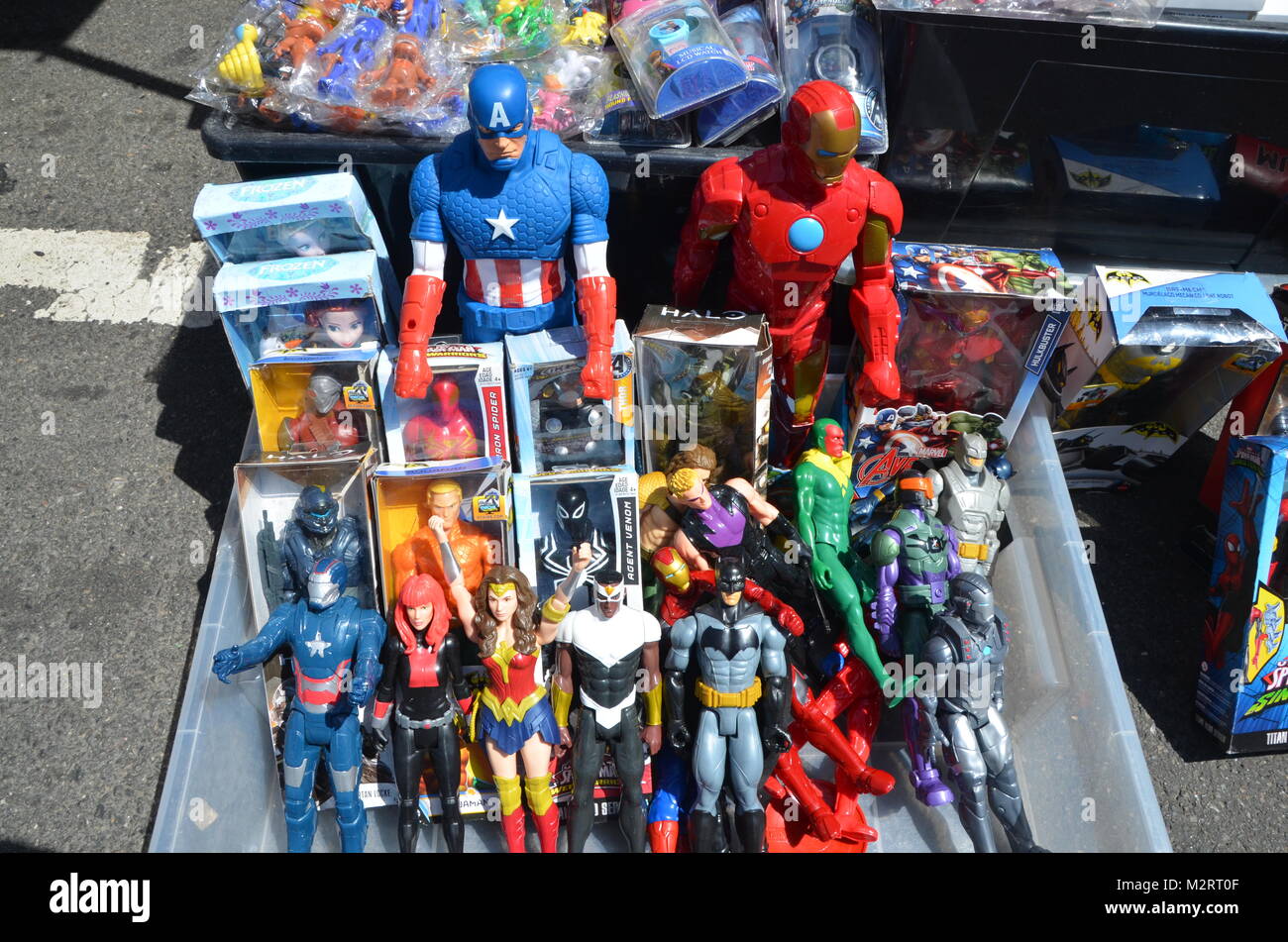 a box of american superhero dolls in brooklyn flea market new york USA Stock Photo