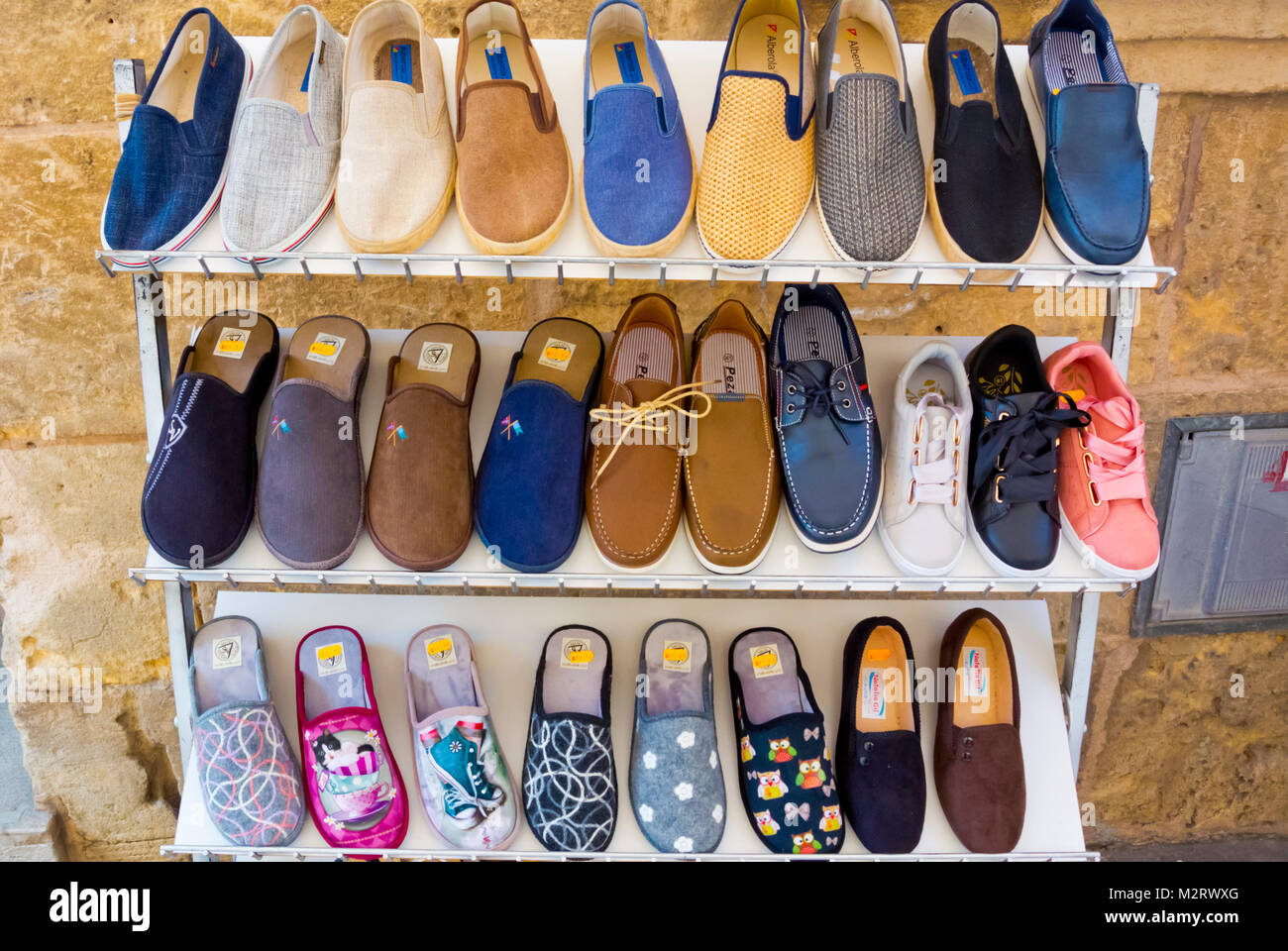 Shoes, Carrer del Moll, old town, Alcudia, Mallorca, Balearic islands,  Spain Stock Photo - Alamy
