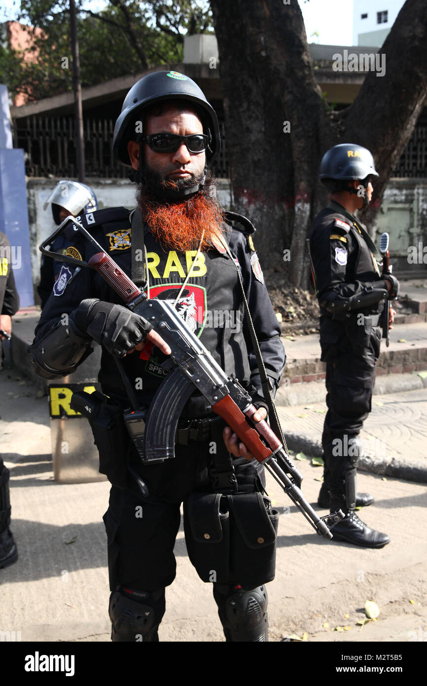 Dhaka, Bangladesh. 8th Feb, 2018. February 08, 2018 Dhaka, Bangladesh - Bangladesh RAB special force member stand guard in the capital Dhaka after the former prime minister and BNP chairperson Khaleda Zia sentenced to five years in prison, in Dhaka, Bangladesh 08 February 2018. BNP leader Khaleda Zia sentenced to five years in prison after a court found her guilty in a corruption case. According to complainant, a grant of 1,255,000 US dollars was transferred from the United Saudi Commercial Bank to the Prime Minister's Orphanage Fund. The then premier Khaleda created the fund shortly bef Stock Photo