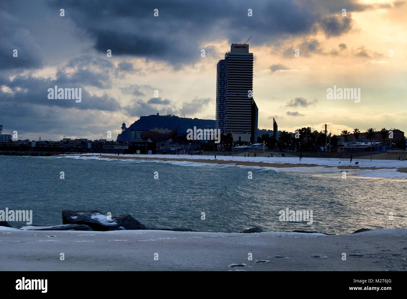 Barcelona, Spain. 8th Feb, 2018. The beach of Barcelona covered by snow. Snowfalls on the Spanish coast are an infrequent meteorological phenomenon. Credit: Dino Geromella/Alamy Live News Stock Photo