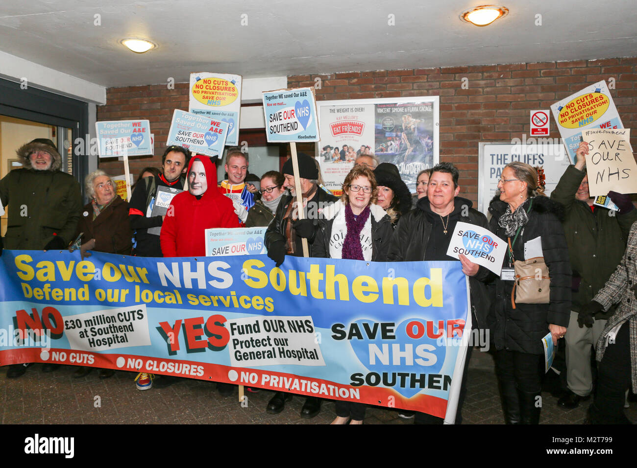 Southend-on-Sea, Essex, UK. 8th Feb, 2018. A small demonstration took place outside the Cliffs Pavilion to protest at the proposed merger of three local hospitals, Southend, Basildon and Broomfield before the public meeting. At the same time The Sustainability and Transformation Partnership (STP) are holding a public meeting to present the proposed changes. Penelope Barritt/Alamy Live News Stock Photo