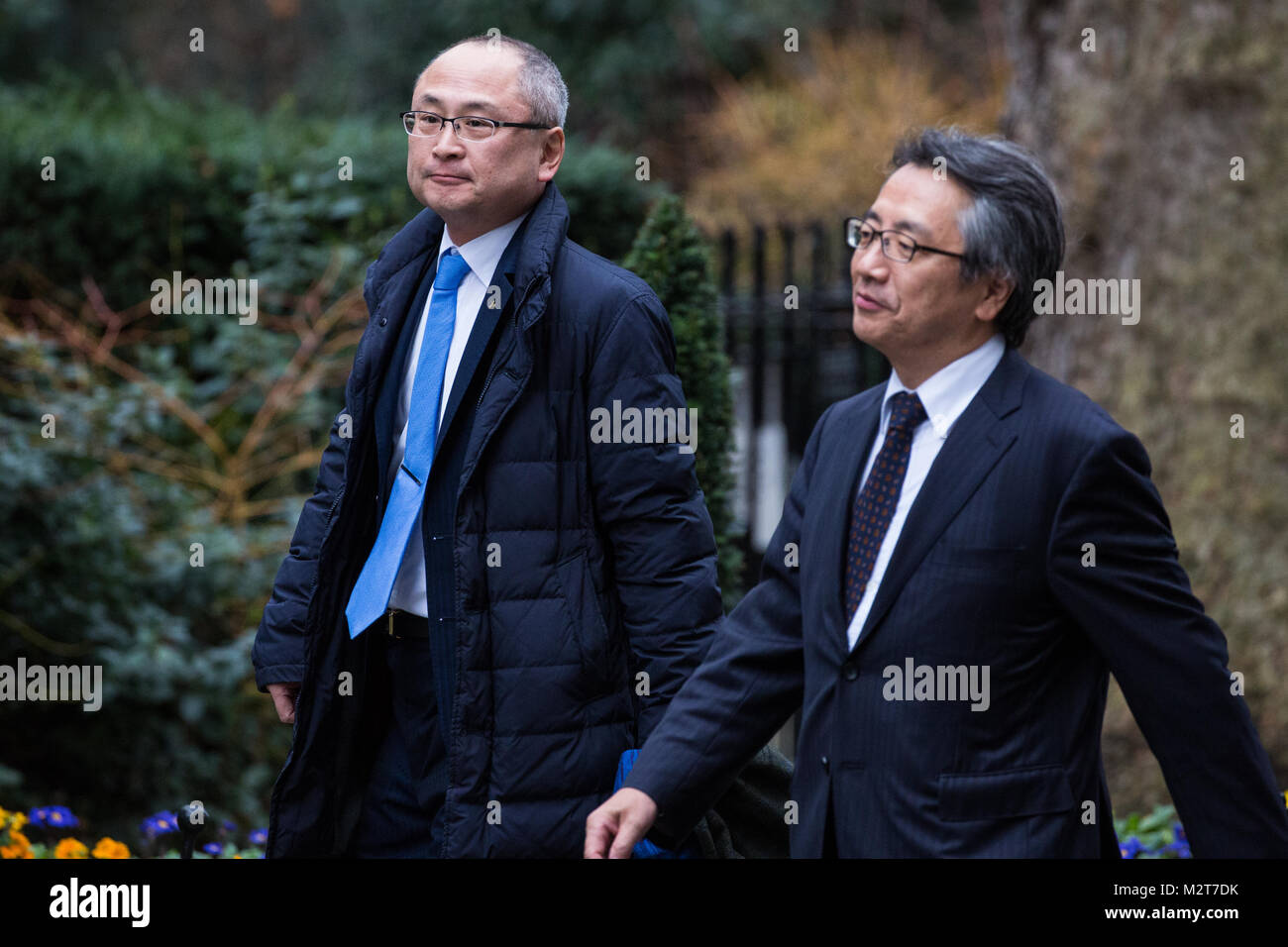 London, UK. 8th February, 2018. Kazuo Okamoto, Chief Executive of Mitsubishi Heavy Industries, and Ken Sakai, Managing Director of KDDI Europe, arrive to attend talks hosted by Prime Minister Theresa May, Chancellor of the Exchequer Philip Hammond, Secretary of State for International Trade Liam Fox and Secretary of State for Business, Energy and Industrial Strategy Greg Clark Credit: Mark Kerrison/Alamy Live News Stock Photo