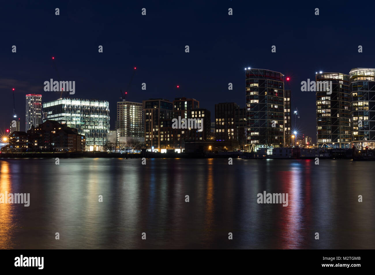 London, England; View Over the River Thames At Night Towards Nine Elms with the New US Embassy on Left Stock Photo