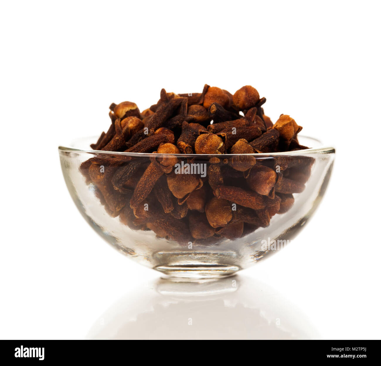 cloves spice on a white background. Cloves aromatic flower buds of a