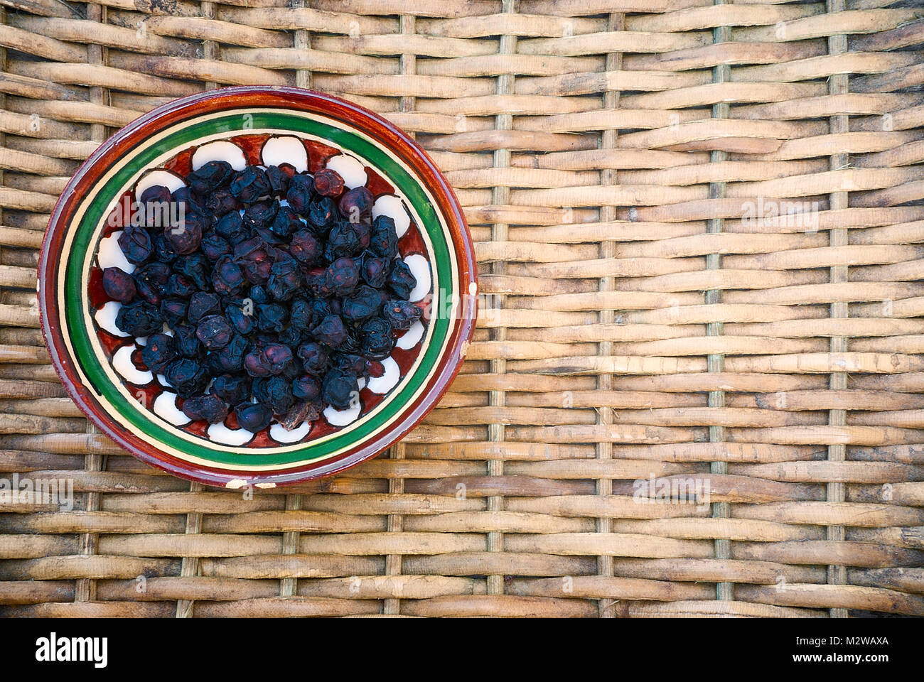 Dried schisandra (Schisandra chinensis) edible fruit known as "five