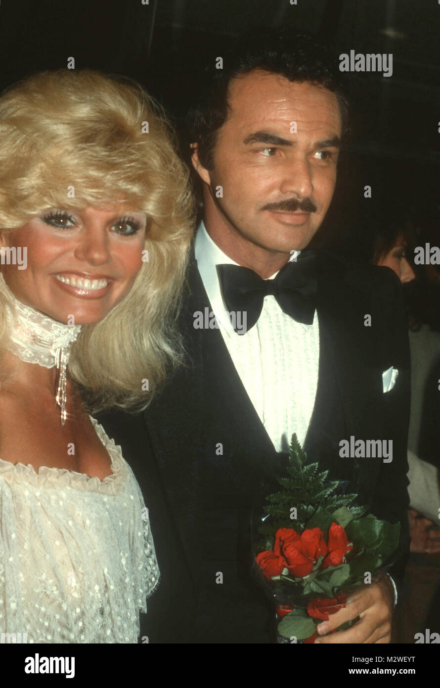 LOS ANGELES, CA - MAY 13: (L-R) Actress Loni Anderson and actor Burt Reynolds attend the Rudolph Valentino Awards at the Century Plaza Hotel on May 13, 1982 in Los Angeles, California. Photo by Barry King/Alamy Stock Photo Stock Photo
