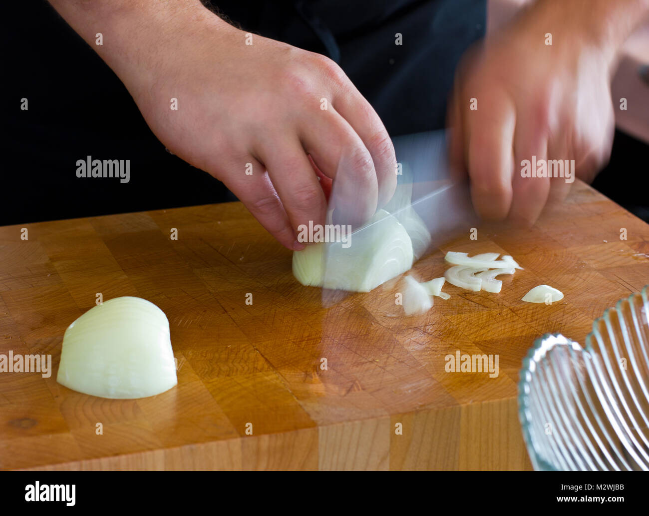 Hands knife cut onions hi-res stock photography and images - Alamy