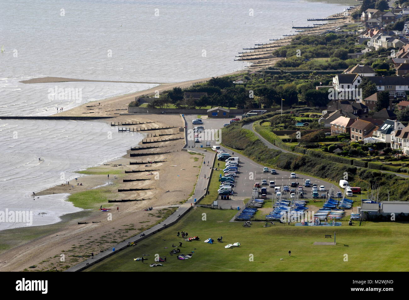 AJAXNETPHOTO. 24TH AUGUST, 2011. HILL HEAD, ENGLAND.  - AERIAL VIEW OF THE BEACH AND CAR PARK ON THE SOUTH COAST OVERLOOKING THE SOLENT. PHOTO:JONATHAN EASTLAND/AJAX REF:D2XS110209 1533 Stock Photo