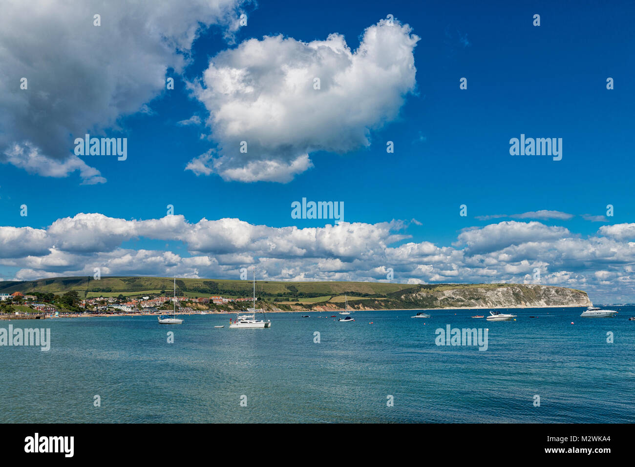 Swanage Bay, Dorset, England, UK and the cliffs of The Purbeck Hills beyond. Stock Photo