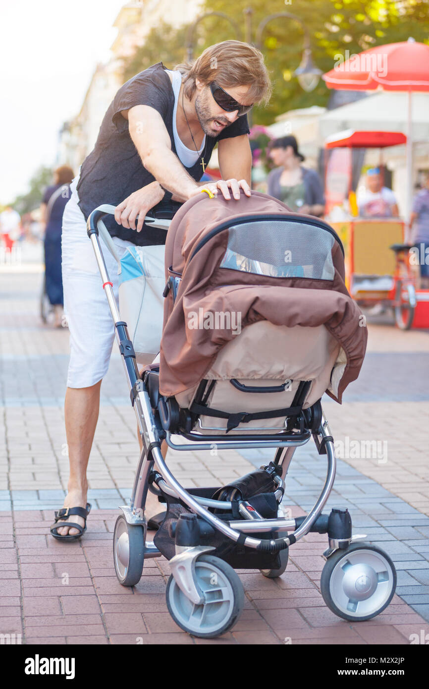 Young Father Stroller Stock Photo