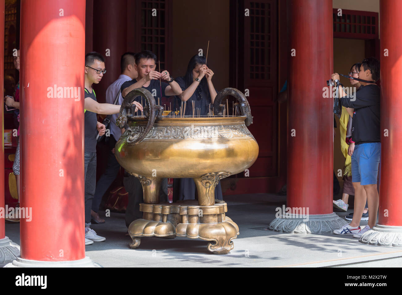 Singapore Asia February 8, 2018 Incense sticks burning at the Buddha