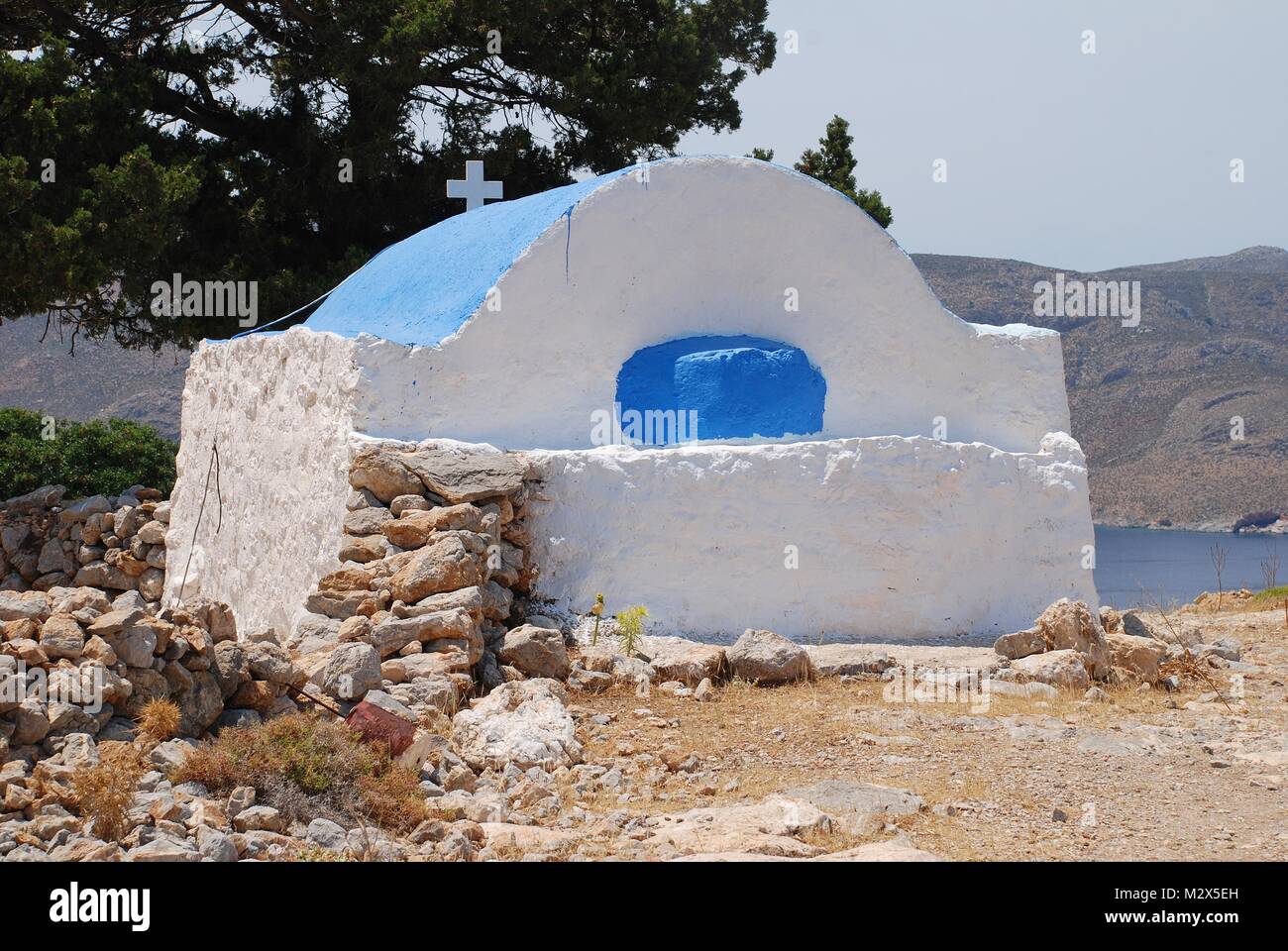 The church of Agios Ioannis (Saint John) by the track to Gera at Livadia on the Greek island of Tilos. Stock Photo