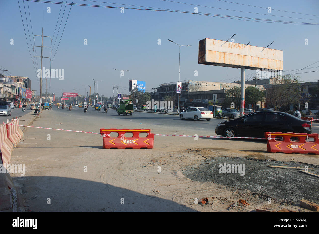 Construction site on highway in Lahore, Pakistan. Stock Photo