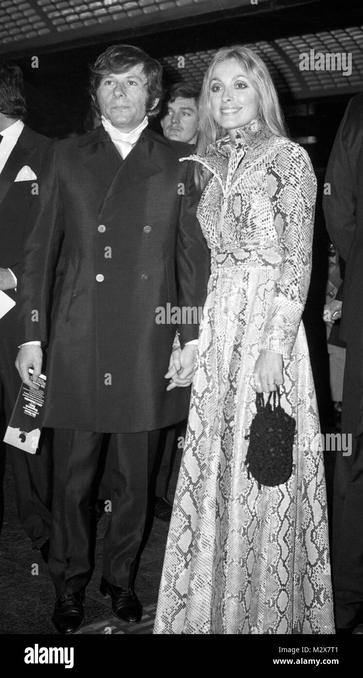 Actress Sharon Tate, wearing a snakeskin dress at the Paramount Cinema, Lower Regent Street, London, for the gala premiere of 'Rosemary's Baby'. She is alongside her husband, Roman Polanski. Stock Photo