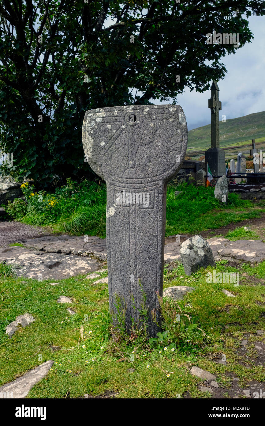 Ireland. Dingle, Kilmalkedar church. Sun dial. This pillar stands at 1.23 metres high and the rectangular shaft and the semi-circular head have a smoo Stock Photo