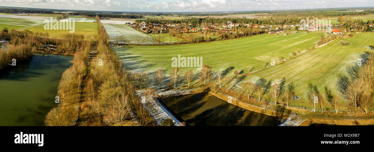 Aerial landscape photo, aerial photo with a lake, fields, meadows, forests and a road, panorama as a banner for a blog or a website, drone landscape p Stock Photo