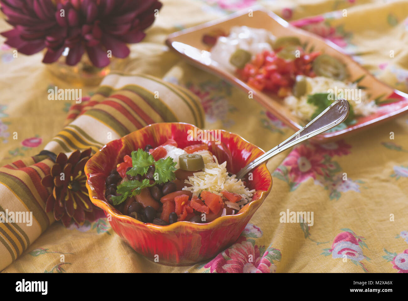 A. bowl of Chili on a colorful background Stock Photo