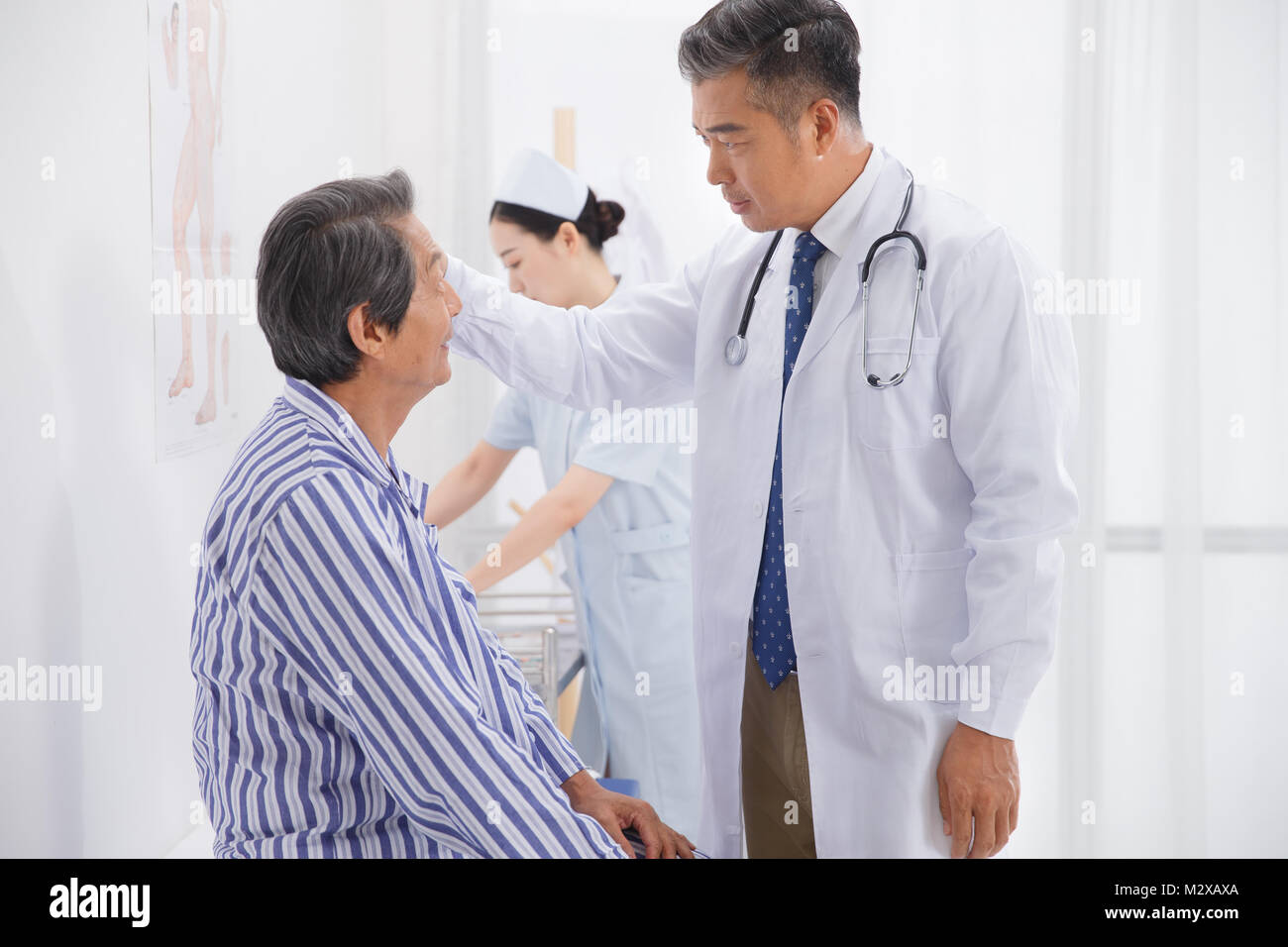 Patient asian young 40s hi-res stock photography and images - Alamy