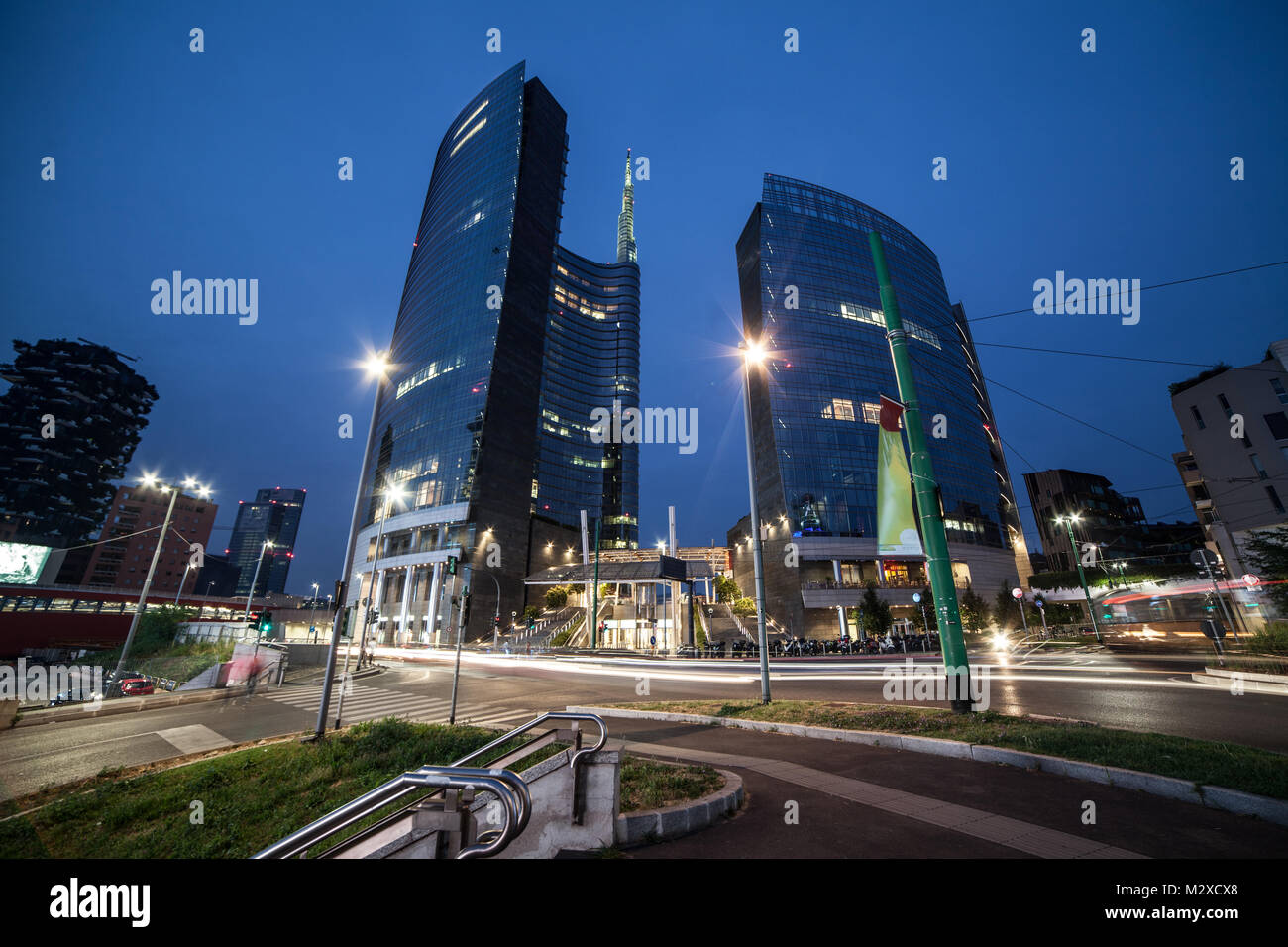 View of modern building at blue hour. The headquarters of business, Italy's largest bank Stock Photo