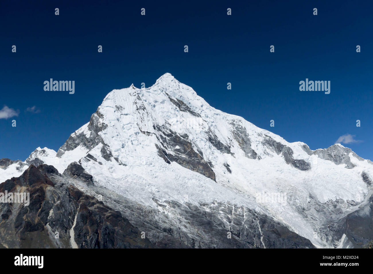 high snow-capped mountain peak landscape in the Cordillera Blanca in the Peruvian Andes Stock Photo
