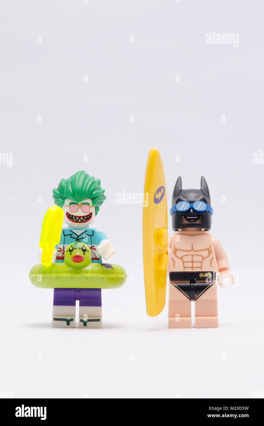 batman holding surf board and joker on vacation . Lego minifigures are  manufactured by The Lego Group. isolated on white background Stock Photo -  Alamy