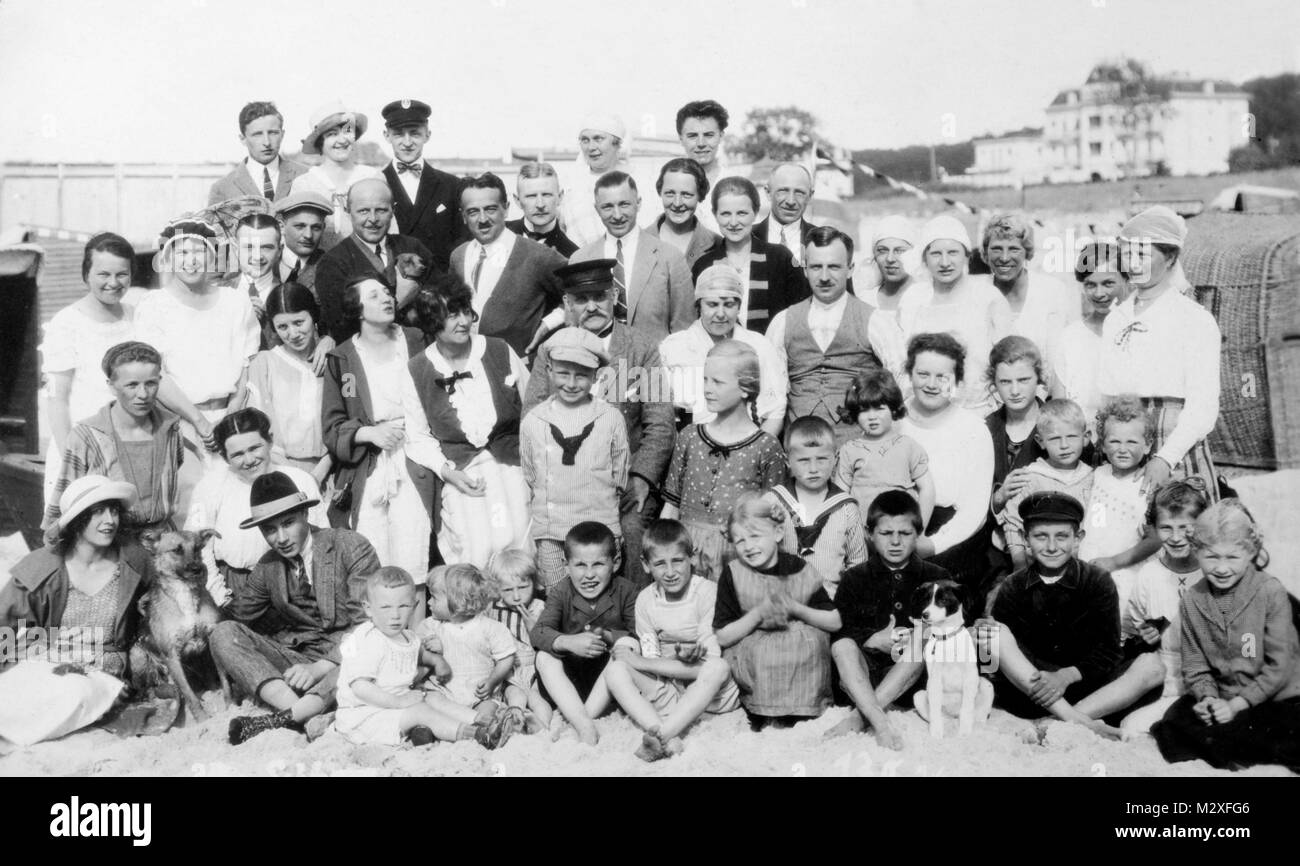 Extended family group portrait on the beach in Germany, ca. 1930. Stock Photo