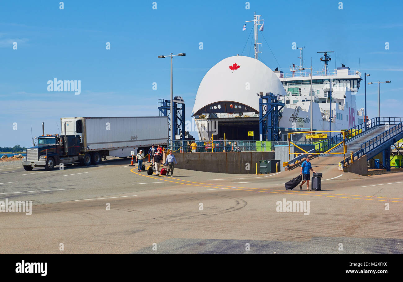 Foot passengers and a truck disembarking from a Northumberland Ferry at Caribou, Nova Scotia, Canada. Stock Photo