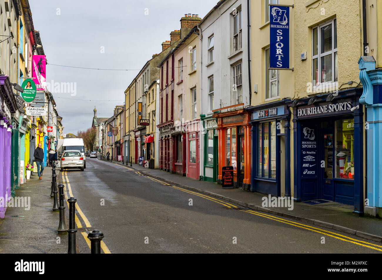 North Street, Skibbereen, County Cork, Ireland, a colourful street full of shops, cafés, restaurants and bars. Stock Photo