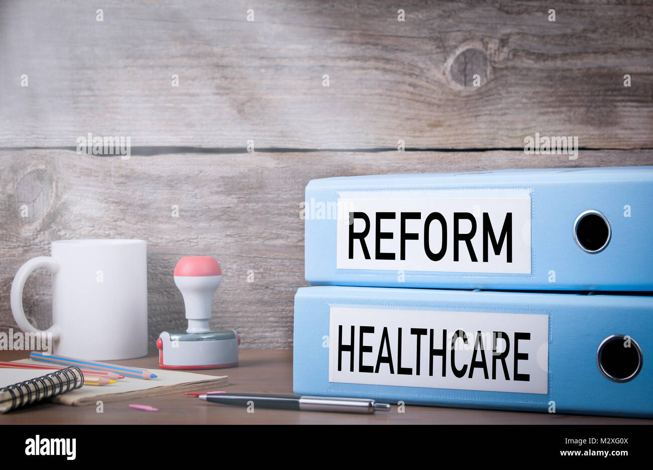 Healthcare Reform. Two binders on desk in the office Stock Photo Alamy
