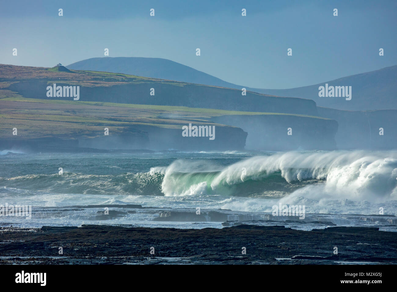 Atlantic storm waves beneath the Ceide Fields, Ballycastle, County Mayo, Ireland. Stock Photo