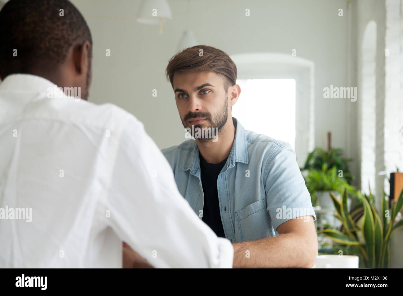 Serious businessman thinking considering decision at business di Stock Photo