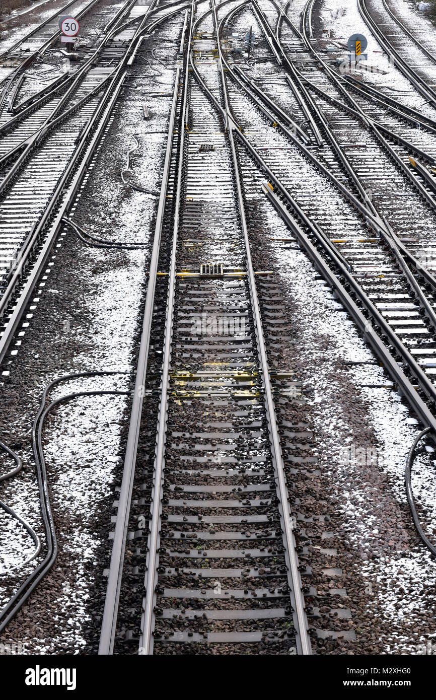 railway tracks covered in snow and cold on an icy winters day causing