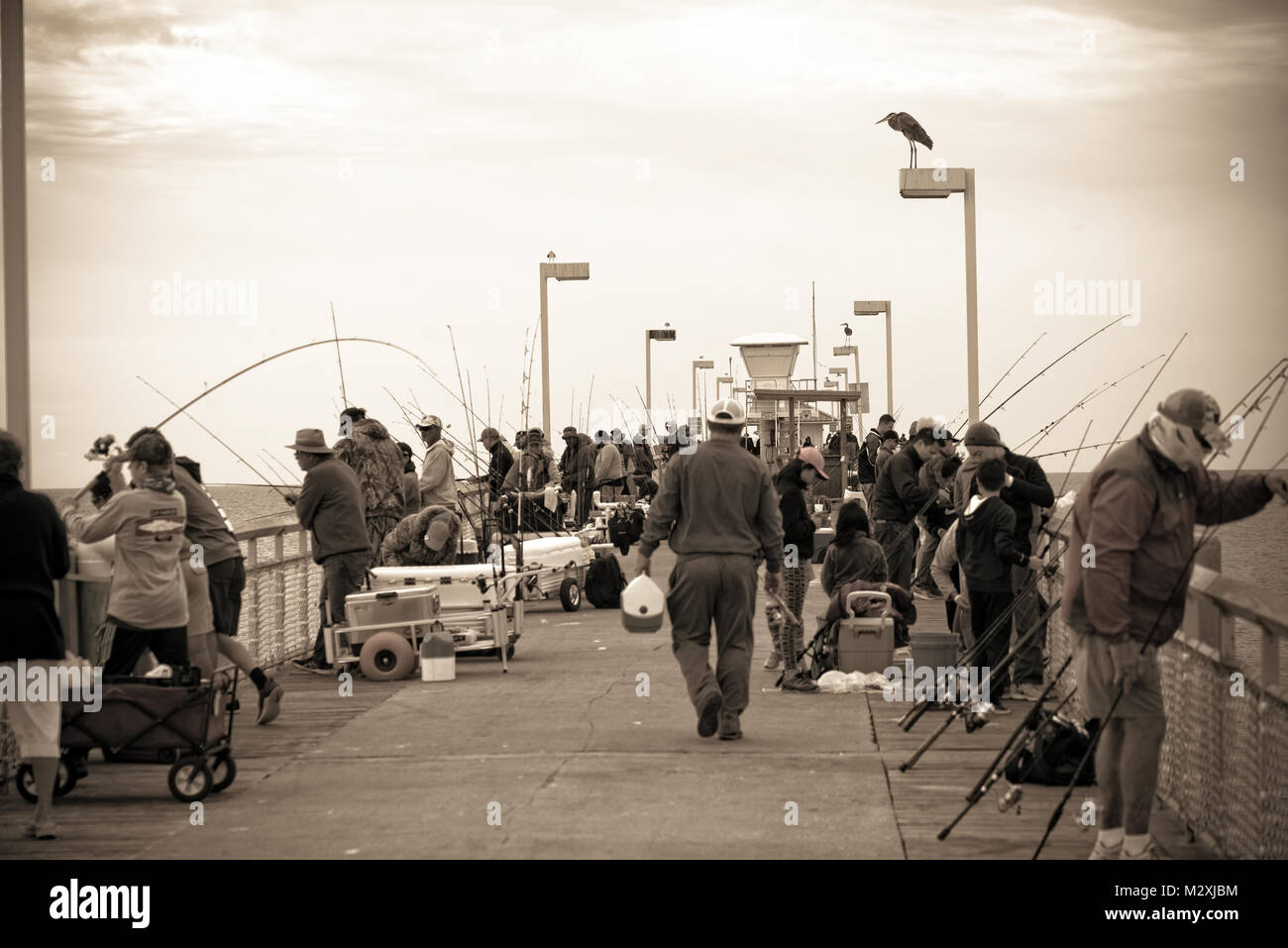 Fishermen on the pier Stock Photo
