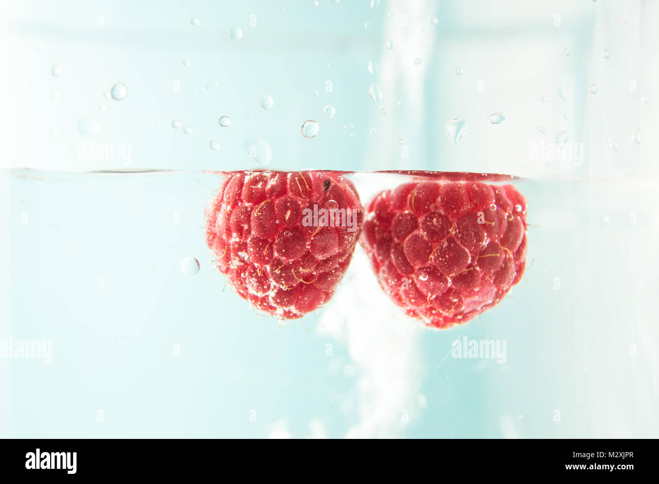 Fresh Raspberry in Water Stock Photo Alamy