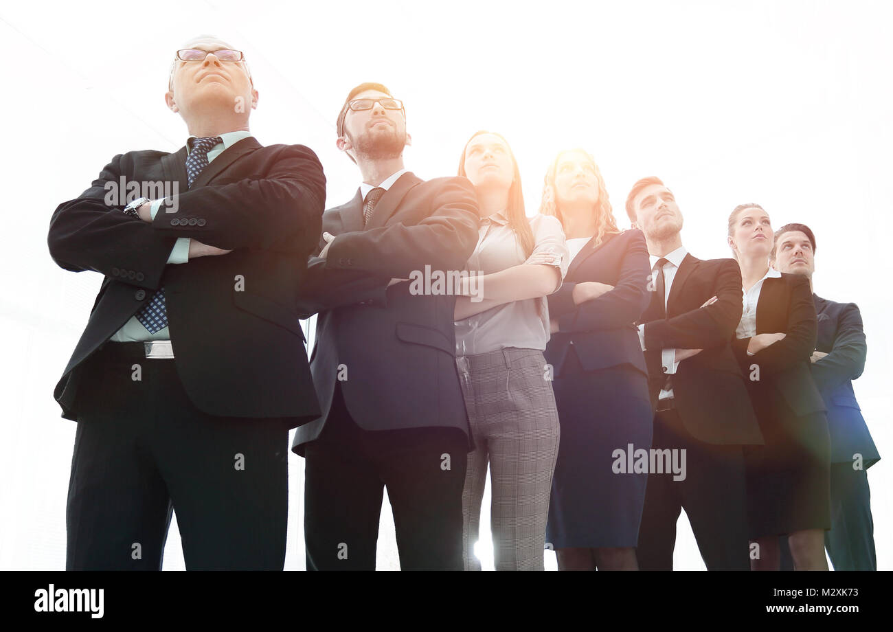 bottom view. successful business team standing together Stock Photo - Alamy