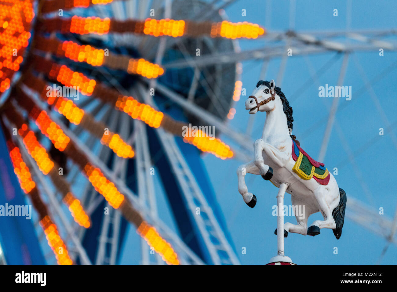 Big wheel and horse, Oktoberfest, 'Wiesn', Munich, blue hour, 'Oide' (old) and new 'Wiesn' Stock Photo