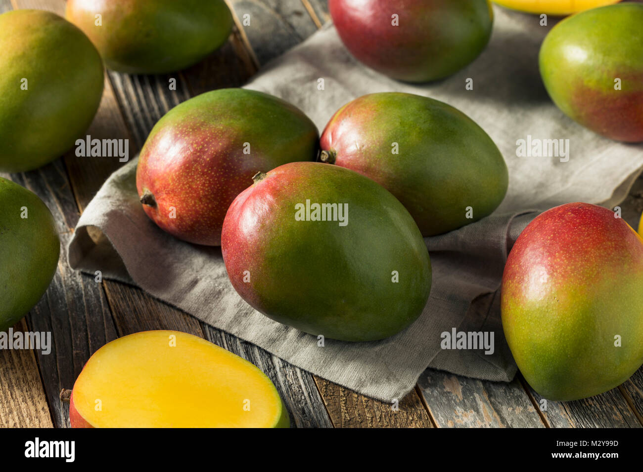 Raw Red Green Organic Mango Fruit Ready to Eat Stock Photo